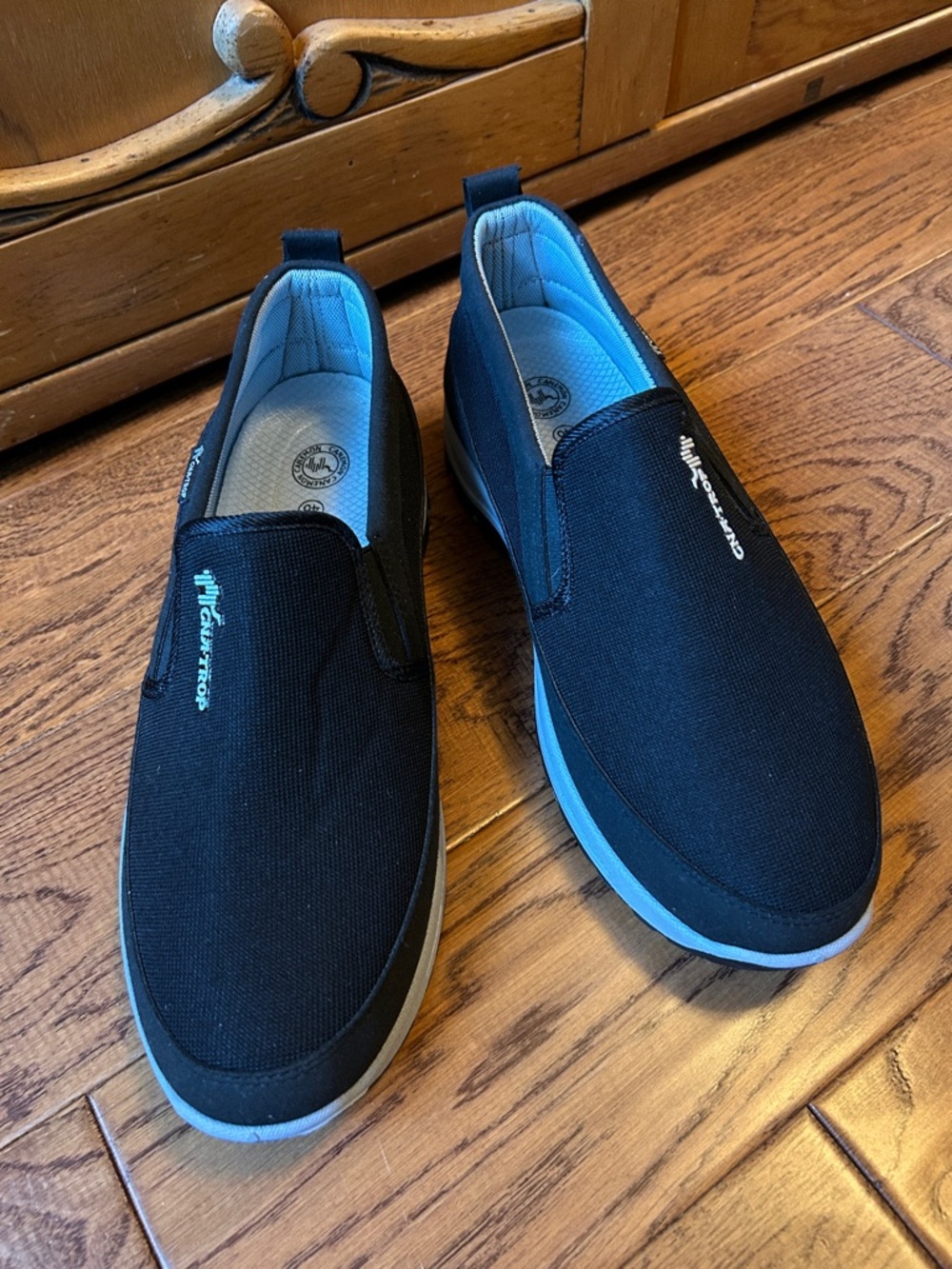 Rockport Men's Black Slip-On Loafers with Light Blue Accents